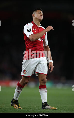 Arsenal's Alexis Sanchez looks dejected during the Europa League match at the Emirates Stadium, London. Stock Photo