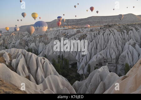 A panoramic view of the Red Valley in Cappadocia from a Balloon at sunrise. Stock Photo