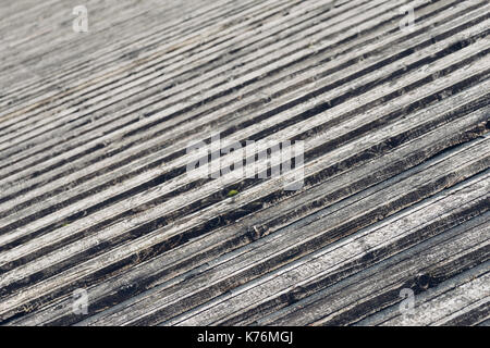 Old wooden planked roof. Background with selective focus Stock Photo