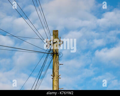 Telegraph pole carrying power and telephone lines in Barnstaple, devon Stock Photo