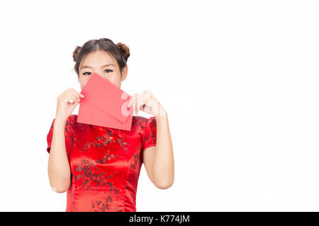 Asian girl in traditional and take Red envelopes chinese new year,Concept celebrating Chinese Lunar New Year or spring festival, ,isolated on white ba Stock Photo