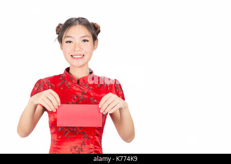 Asian girl in traditional and take Red envelopes chinese new year,Concept celebrating Chinese Lunar New Year or spring festival, ,isolated on white ba Stock Photo