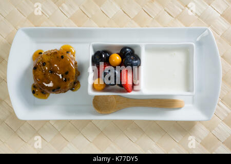 Close-up of healthy breakfast in serving plate on place mat Stock Photo
