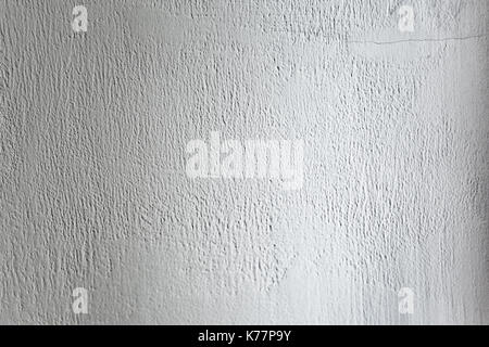 Rough light white colored surface for backgrounds and textures. Stock Photo
