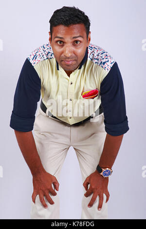Young man looking at camera Stock Photo