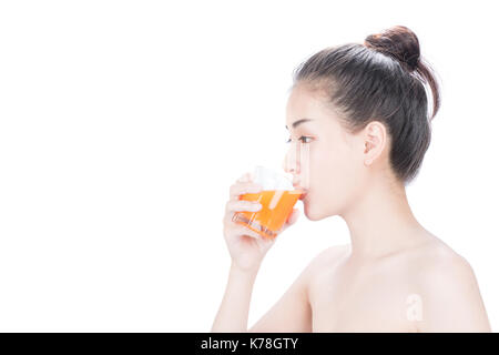 woman isolated on white studio shot drinking orange juice face skin Stock Photo