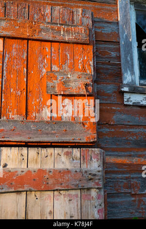 Red painted barn door Stock Photo