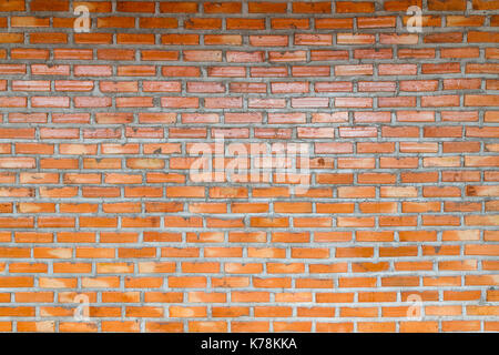 Weathered texture of stained old dark brown and red brick wall background, grungy rusty blocks of stone-work technology, colorful horizontal architect Stock Photo