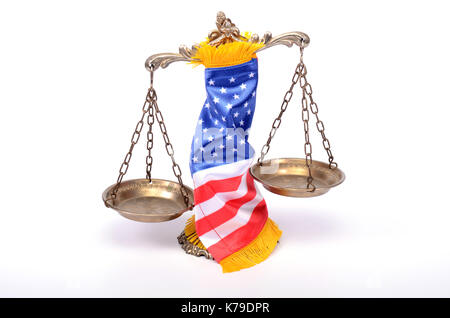 Scales of justice rolled up with  American flag, law and justice concept. Stock Photo
