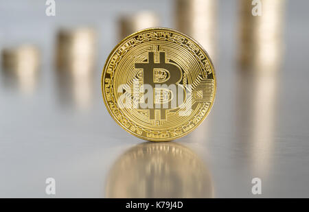 Crypto currency concept - Bitcoin with coin stacks Stock Photo