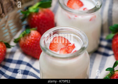 Strawberry Yoghurt. Healthy food with Strawberries and yoghurt breakfast on table. Stock Photo