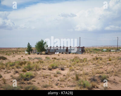 Kayenta, AZ - 25 July 2016: Rural housing estate of Native Americans at the Navajo reservation (Navajo Nation) in the Arizona desert. With a populatio Stock Photo