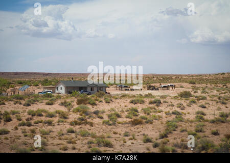 Kayenta, AZ - 25 July 2016: Rural housing estate of Native Americans at the Navajo reservation (Navajo Nation) in the Arizona desert. With a populatio Stock Photo