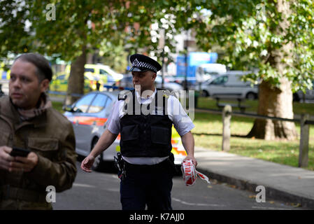 A terrorist bomb explosion has occurred at Parsons Green Underground Station London. Emergency services on scene Stock Photo