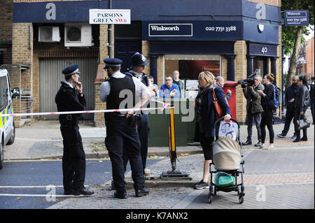 London, UK. 15th Sep, 2017. Policemen stands around the Parsons Green Underground Station. Several injured at Parsons Green as passengers report seeing device on District Line tube train during morning rush-hour. A large police deployment is guarding the access to the station. The nearest houses to the station have been evacuated until the zone is safe. The police warms more explosives. On September 15, 2017 in London, United Kingdom. Credit: SOPA Images Limited/Alamy Live News Stock Photo