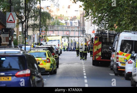 London, UK. 15th Sep, 2017. Firefighters are seen around the Parsons Green Underground Station. Several injured at Parsons Green as passengers report seeing device on District Line tube train during morning rush-hour. A large police deployment is guarding the access to the station. The nearest houses to the station have been evacuated until the zone is safe. The police warms more explosives. On September 15, 2017 in London, United Kingdom. Credit: SOPA Images Limited/Alamy Live News Stock Photo