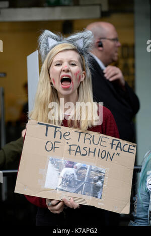 Protesters gathered outside The Store Studios during London Fashion Week to demonstrate their feelings on the use of fur. Animal rights protest Stock Photo