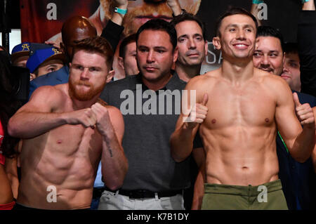 Las Vegas, NV, USA. 15th Sep, 2017. (L-R) CANELO ALVAREZ poses off with GGG aka GENNADY GOLOVKIN during the weighs in's at the MGM grand hotel Friday. Canelo Alvarez will be fighting GGG Saturday at the T-Mobile arena for the WBC, WBA, IBF, IBO ring middleweight titles. Credit: Gene Blevins/ZUMA Wire/Alamy Live News Stock Photo