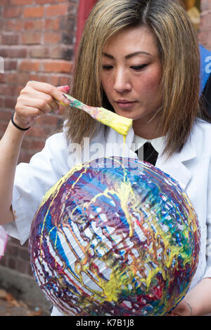 Seattle, United States. 15th Sep, 2017. Seattle, Washington: A woman paints a lantern at the Powerhouse Art Studio at the lantern making workshop for the upcoming ‘Luminata' Lantern Parade. All are welcome to the Powerhouse to create lanterns, costumes and art to celebrate the autumnal equinox for the illuminated procession around Green Lake. The annual event held at dusk on the autumnal equinox is produced by the Fremont Arts Council, an organization that supports the arts and artists in and around the Fremont neighborhood of Seattle. Credit: Paul Christian Gordon/Ģ����ý Live News Stock Photo