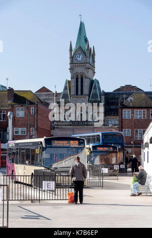 The refurbished bus station with a backdrop of the Guildhall in Winchester, Hampshire, UK. September 2017 Stock Photo