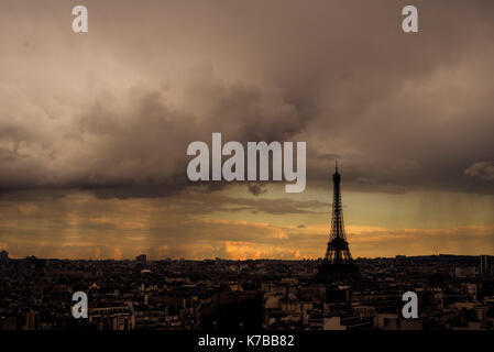 Eiffel tower view from the top of the Arc de Triomphe on a rainy day. Stock Photo