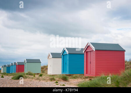 Colourful Beach Huts on the coast at Findhorn, Moray, Scotland. Stock Photo
