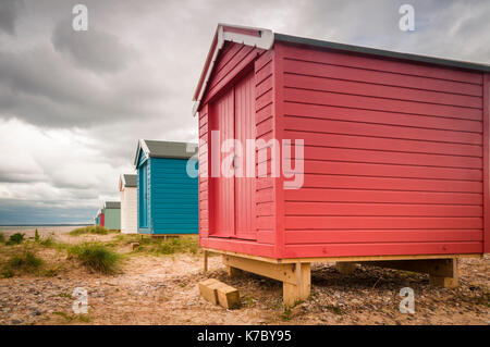 Colourful Beach Huts on the coast at Findhorn, Moray, Scotland. Stock Photo