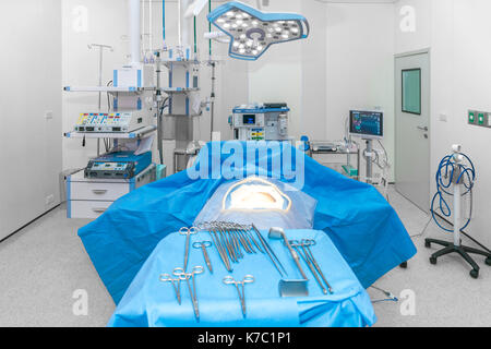 Interior view of operating room with equipment and medical devices in modern operating room at hospital. Stock Photo