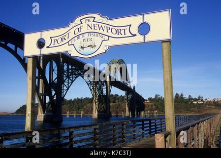 Newport Public Fishing Pier with Yaquina Bay Bridge, Newport, Oregon Stock Photo