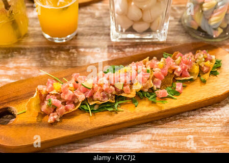 tuna tatare seafood fresh appetizer cuisine served with chip Stock Photo