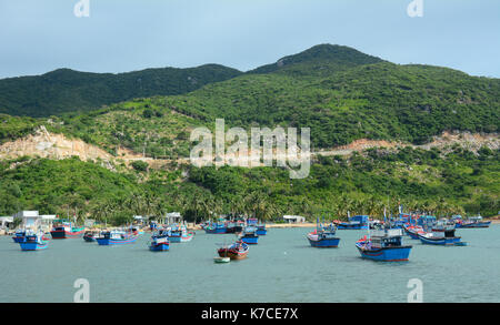 Fishing boats docking at the main pier at Ninh Chu township, Phan Rang, southern Vietnam. Phan Rang is one of famous destinations in southern Vietnam. Stock Photo