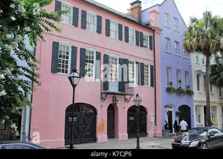 Two of the series of thirteen colorful historic houses on East Bay Street known as Rainbow Row in Charleston, South Carolina Stock Photo