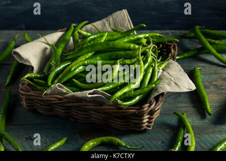 Organic Green Finger Peppers in a Basket Stock Photo