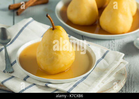 Sweet Homemade Poached Pears in a Wine Sauce Stock Photo