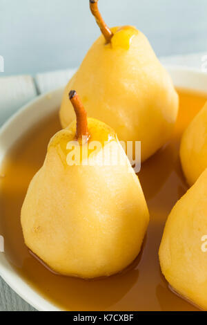Sweet Homemade Poached Pears in a Wine Sauce Stock Photo