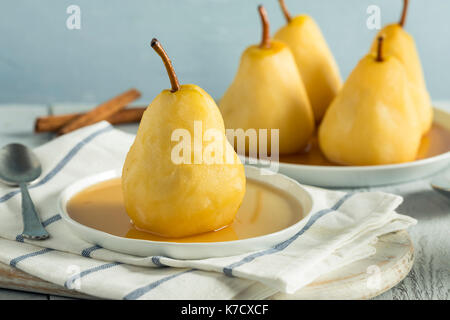 Sweet Homemade Poached Pears in a Wine Sauce Stock Photo