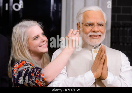 Photo Must Be Credited ©Alpha Press 065630 28/04/2016 Indian Prime Minister, Narendra Modi, this morning took his place alongside other world leaders at Madame Tussaud's London. His new wax figure today arrived at the Baker Street attraction fresh from Delhi, where Mr Modi had a private viewing with his likeness last week.  Madame Tussauds studio artist, Rebecca Ozkural puts the finishing touches to the figure. Stock Photo