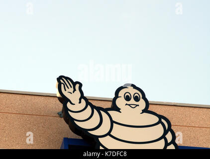 Bibendum man at the front of Michelin headquarters building, Clermont-Ferrand, Puy-de-Dome, Auvergne, Massif Central, France Stock Photo