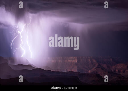 Lightning strikes during a thunderstorm over the Grand Canyon Stock Photo