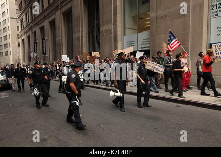 Supporters of the 'Occupy Wall Street' movement protest in New York's Financial District on September 21, 2011. The protests are part of an ongoing pr Stock Photo