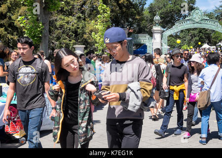 Crowds of students at the University of California Berkeley campus during a Spring open house known as Cal Day. Stock Photo
