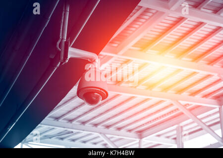 CCTV Security dome camera on outdoor public space. Stock Photo