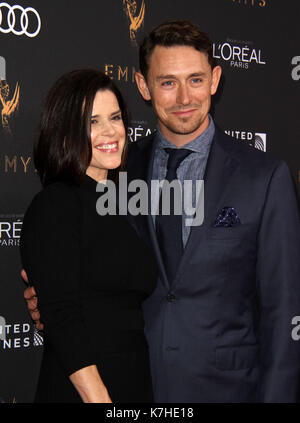 Neve Campbell & husband JJ Feild attending the Skyscraper New York ...