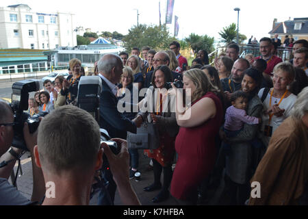 Party leader Vince Cable arrives at Liberal Democrat Autumn Conference in Bournemouth with his wife Rachel, and will be greeted by party activists Stock Photo