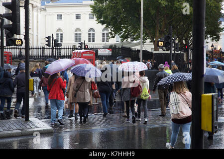 London,UK,16th September 2017,Sudden heavy downpour in The Strand, London sends people dashing for cover on a busy Saturday afternoon.©Keith Larby/Alamy Live News Stock Photo