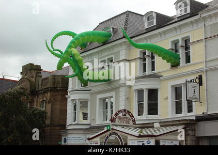 Llandudno,Wales,UK Saturday 16 September 2017  These green tentacles waving from the towns victoria shopping centre are art attacks, a work created by street artist filthy luker as part of the Llawn05 festival. Credit: Mike Clarke/Alamy Live News Stock Photo