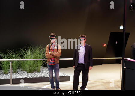 Frankfurt, Germany. 15th September 2017. Visitors use virtual reality headsets at the Mercedes booth. The 67. Internationale Automobil-Ausstellung (IAA in Frankfurt is with over 1000 exhibitors one of the largest Motor Shows in the world. The show will open for the general public from the 16th until the 24th September. Stock Photo