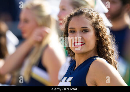 Alumni Stadium. 16th Sep, 2017. MA, USA; A Notre Dame cheerleader looks on during the NCAA football game between Notre Dame Fighting Irish and Boston College Eagles at Alumni Stadium. Anthony Nesmith/CSM/Alamy Live News Stock Photo