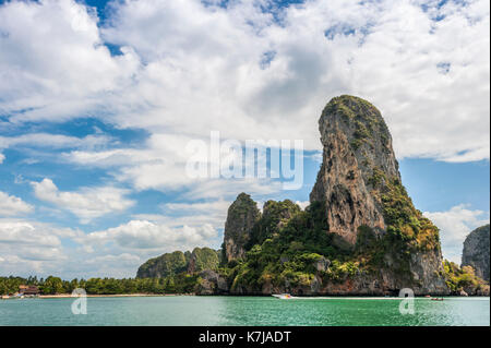 Tourists on the beach. Limestone rocks of South Thailand Stock Photo