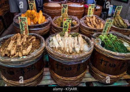 Kyoto, Japan -  May 17, 2017:Preserved vegetables, tsukemono, in wooden barrels for sale on the Nishiki market Stock Photo